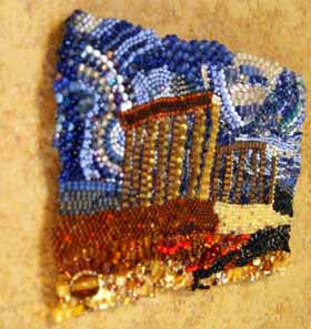 Beadwork is mounted to tile with Velcro which elevates it above the surface.