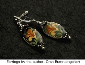Earrings by Oran Bumroongchart